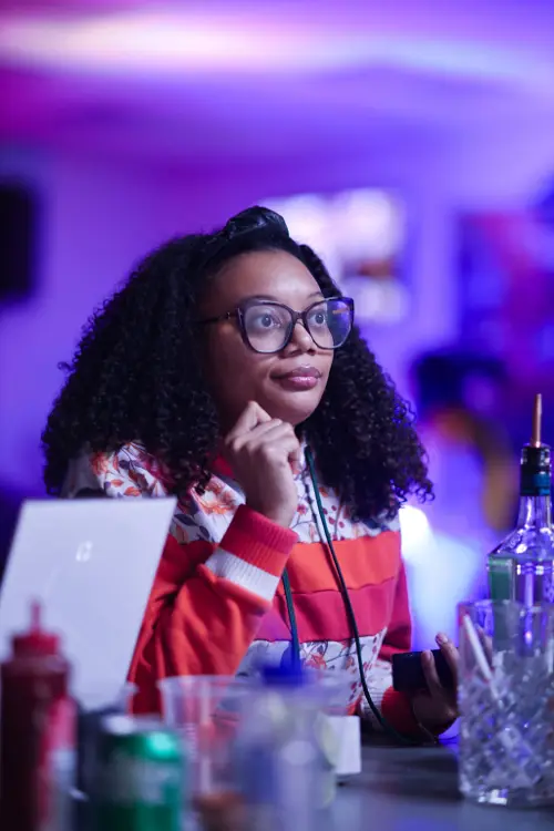 Guest in glasses relaxing between songs